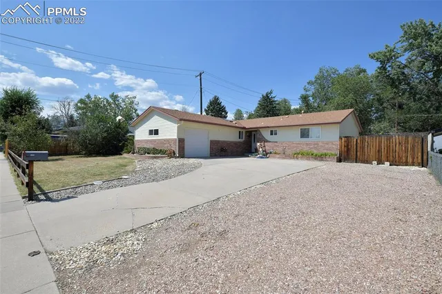a house with yard in front of it