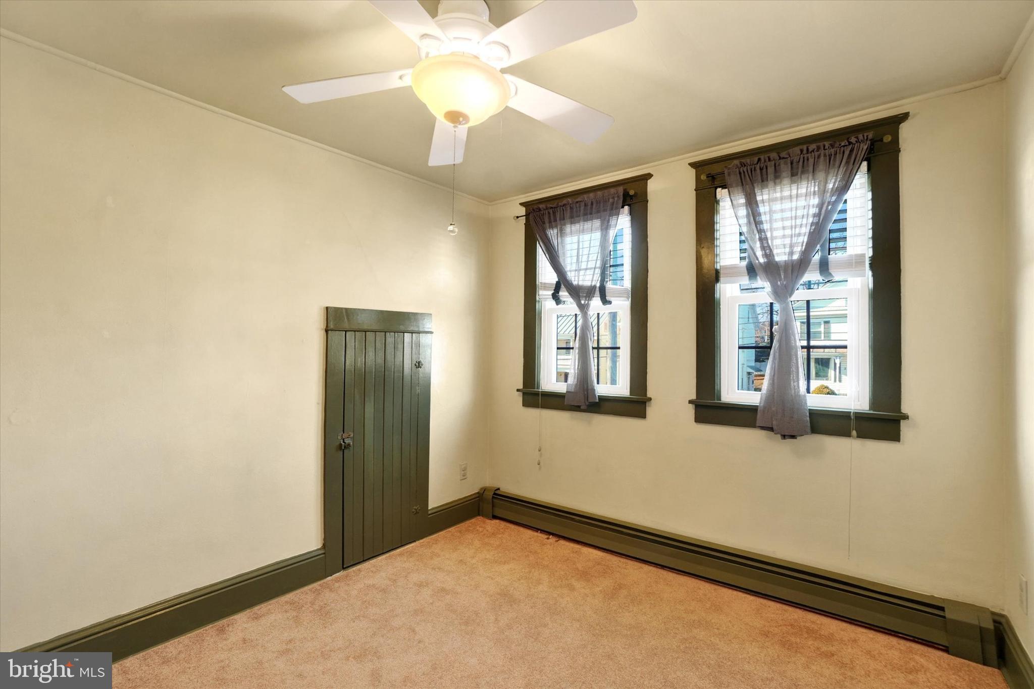 370 East Market Street York, PA 17406 - Photo 13 of 27 an empty room with windows and closet