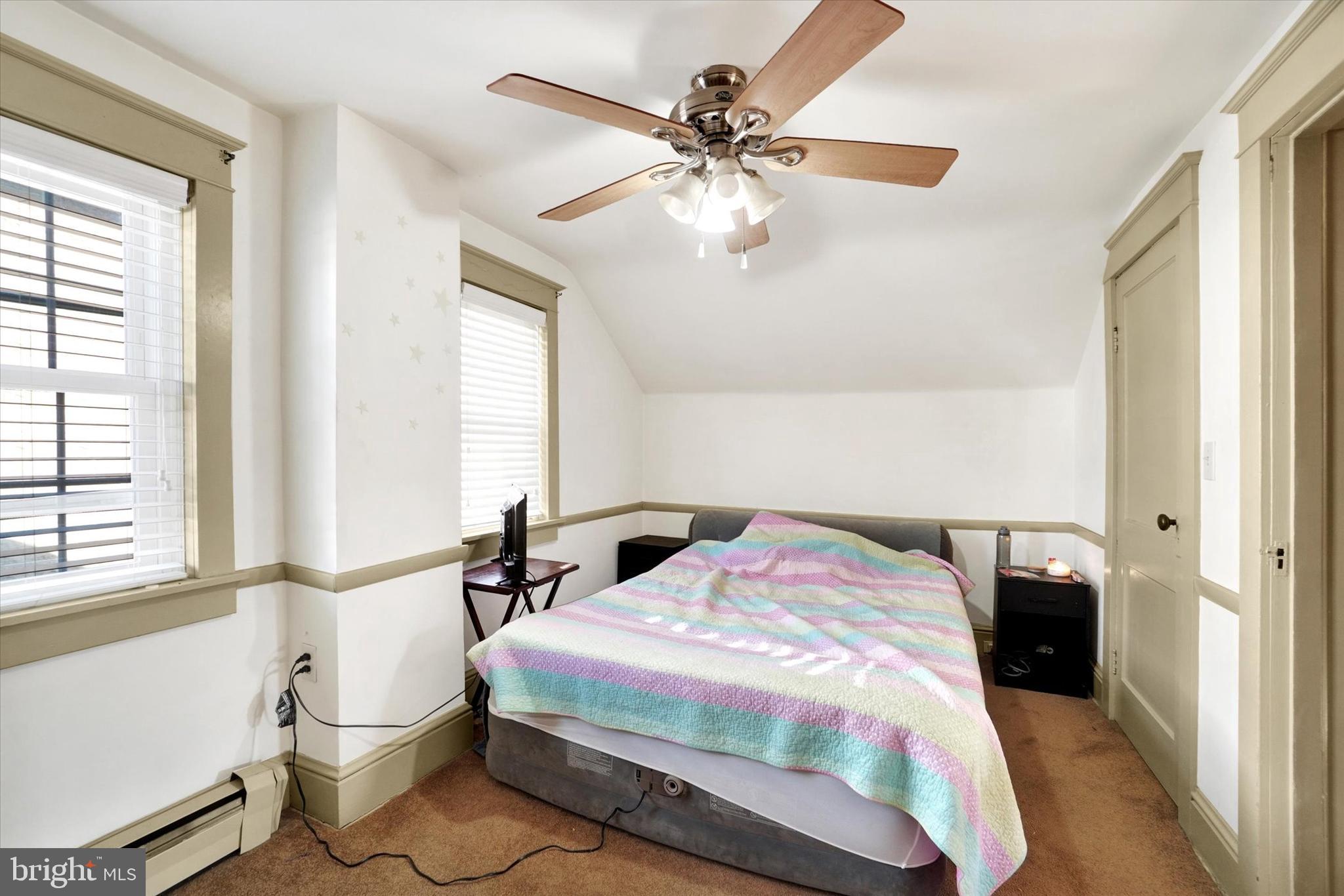 370 East Market Street York, PA 17406 - Photo 15 of 27 a bedroom with a bed and a window