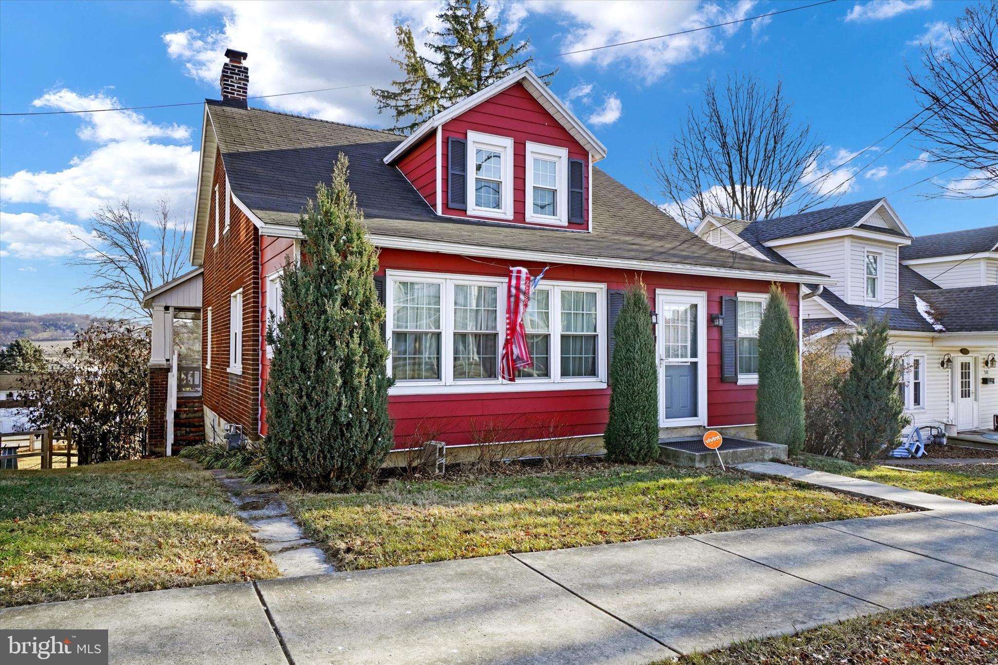 370 East Market Street York, PA 17406 - Photo 2 of 27 a front view of a house with garden