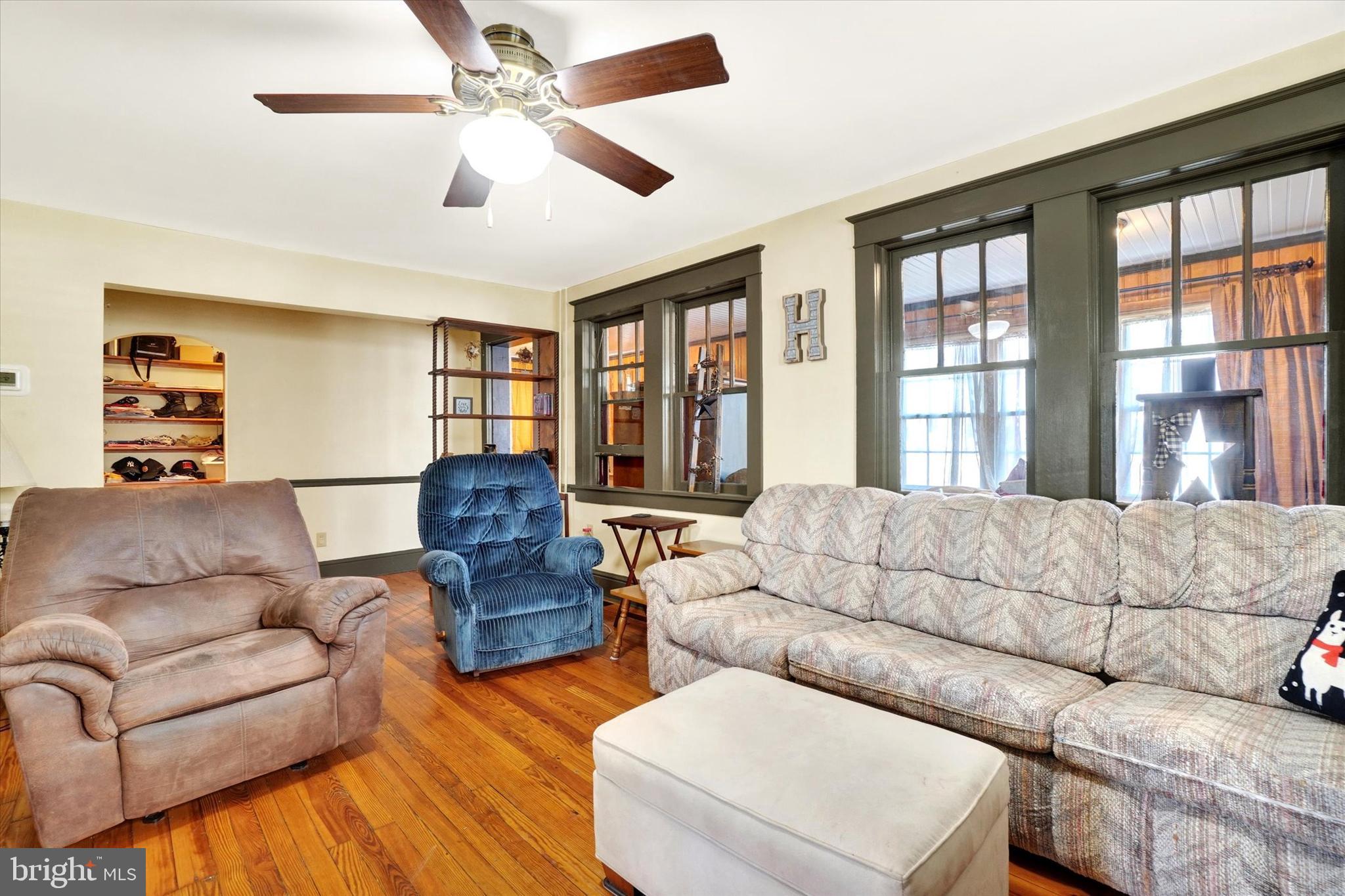 370 East Market Street York, PA 17406 - Photo 6 of 27 a living room with furniture and a large window