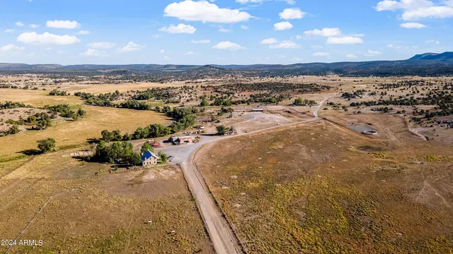 a view of an ocean and a mountain
