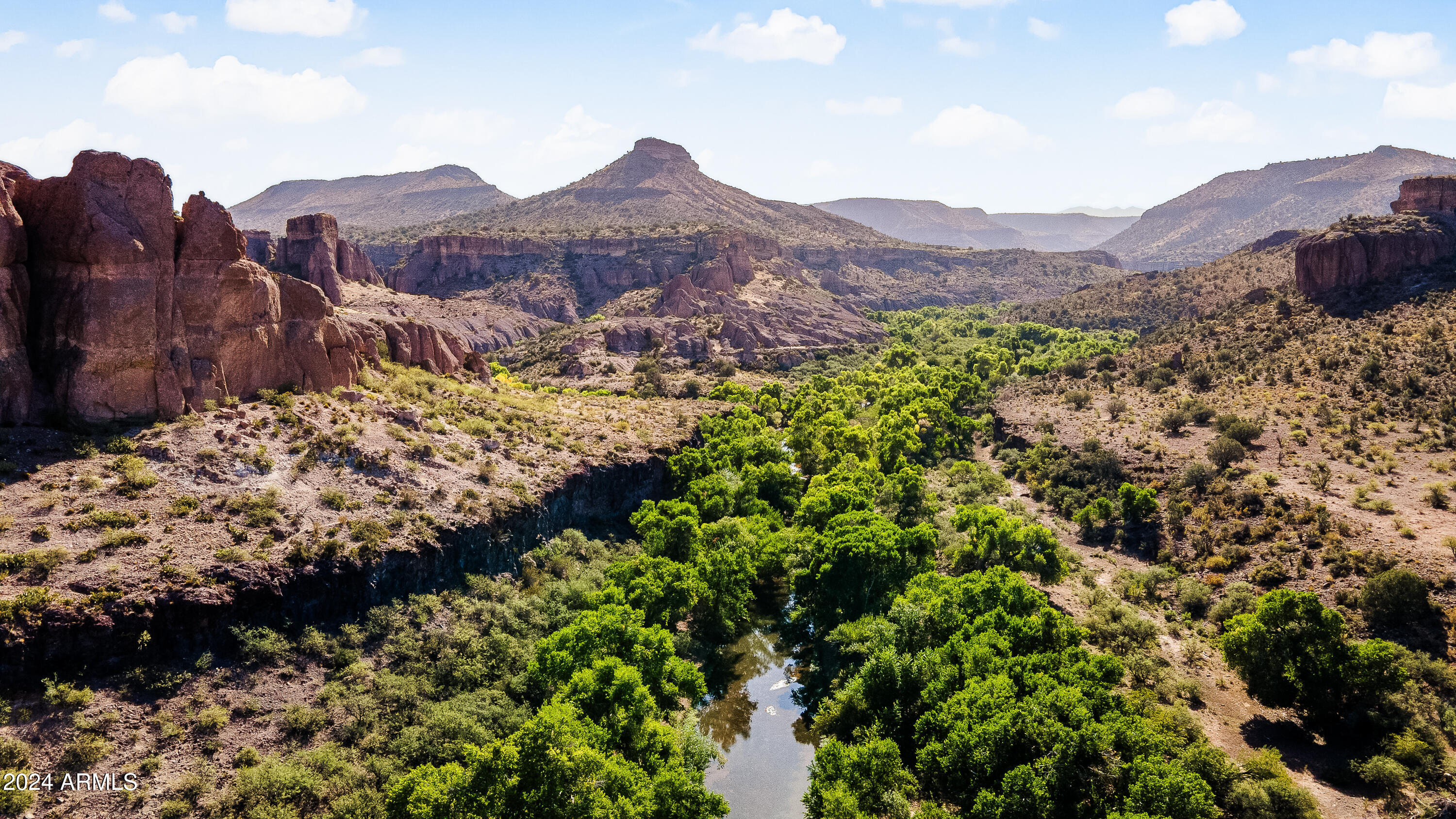 4820 East Perkinsville Road Chino Valley, AZ 86323 - Photo 9 of 128 a view of a mountain with a yard