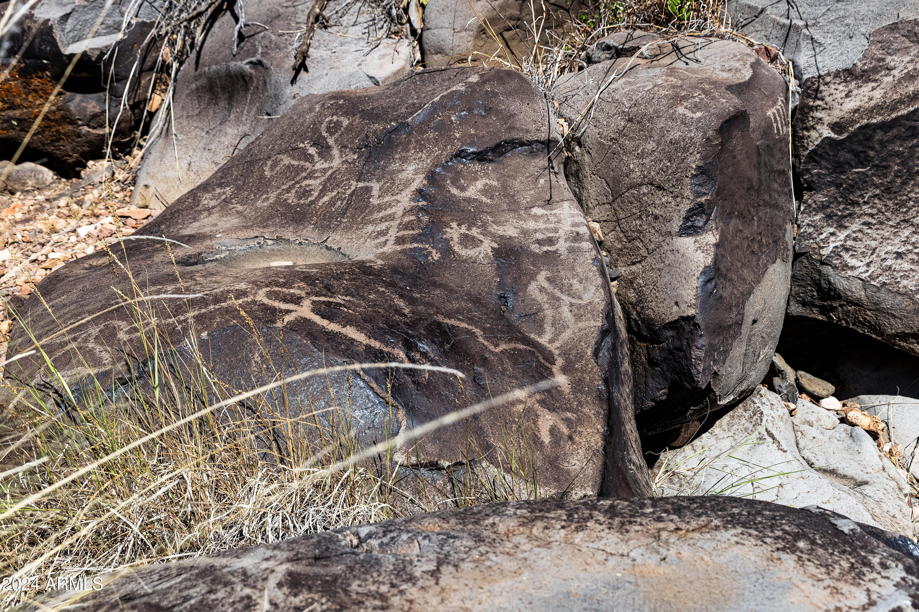 4820 East Perkinsville Road Chino Valley, AZ 86323 - Photo 10 of 128 a backyard of a house with a yard and garage