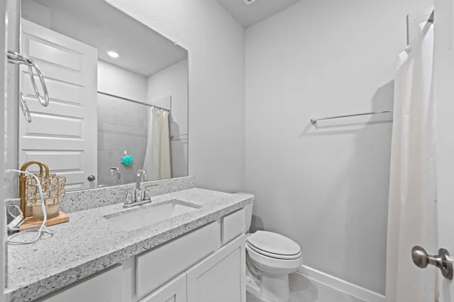 a room with cabinets and a wooden floor