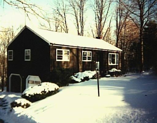 20 Jamestown Road Trumbull, CT 06611 - Photo 1 of 1 a backyard of a house with table and chairs