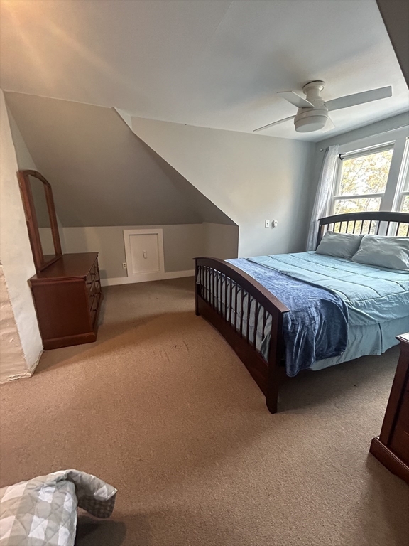 126 Summer Street, Unit 2 Kingston, MA 02364 - Photo 11 of 16 a bedroom with a bed and window
