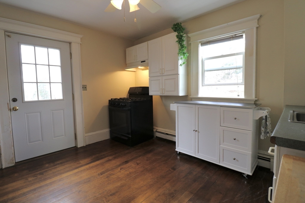 126 Summer Street, Unit 2 Kingston, MA 02364 - Photo 6 of 16 wooden floor and window in a room