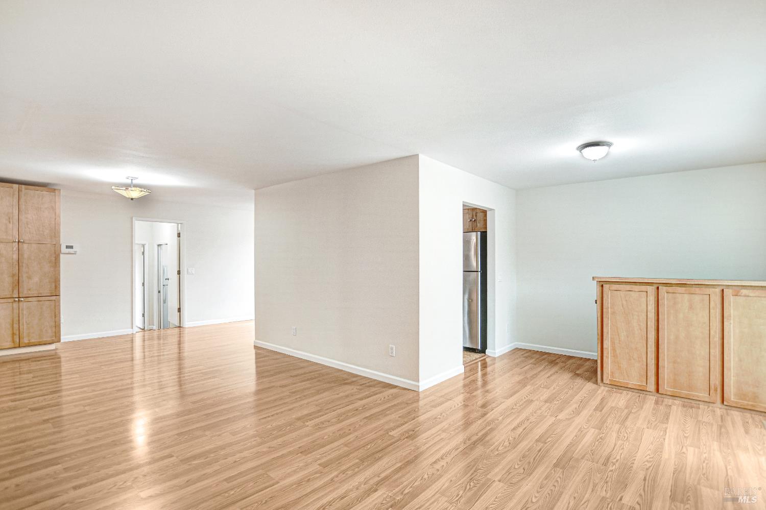 7257 Belita Avenue Rohnert Park, CA 94928 - Photo 16 of 37 a view of an empty room with wooden floor