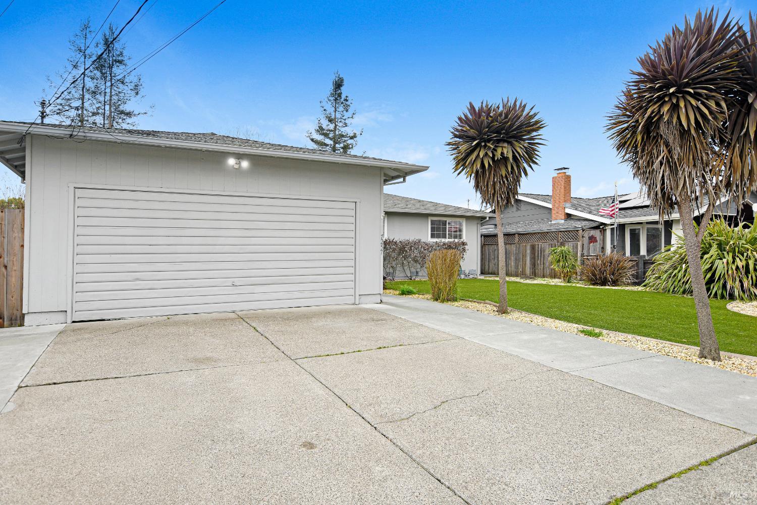 7257 Belita Avenue Rohnert Park, CA 94928 - Photo 17 of 37 a front view of house with yard and green space