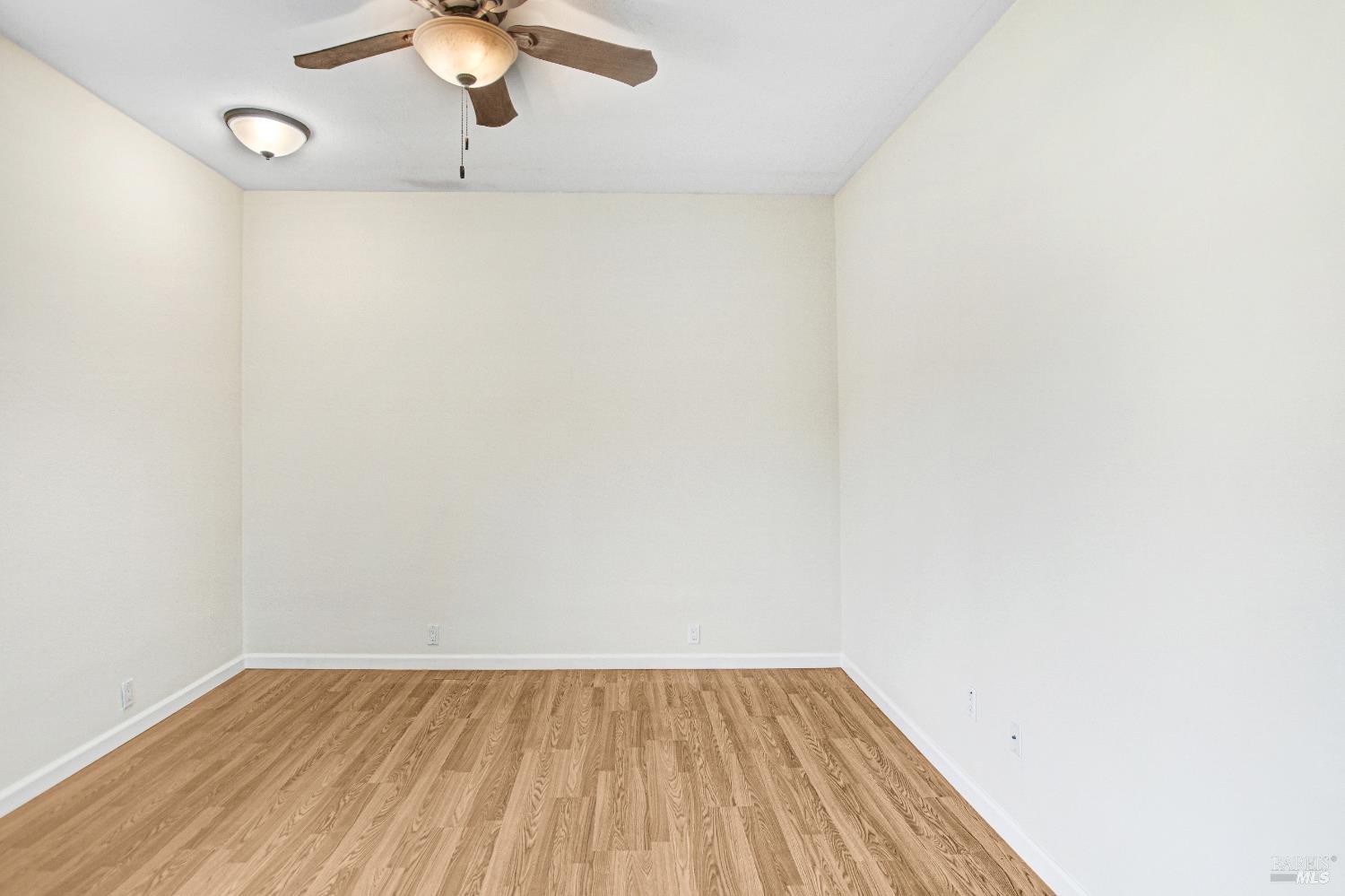 7257 Belita Avenue Rohnert Park, CA 94928 - Photo 23 of 37 a view of a room with wooden floor