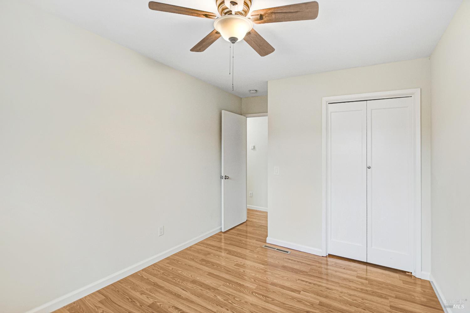 7257 Belita Avenue Rohnert Park, CA 94928 - Photo 28 of 37 a view of empty room with wooden floor