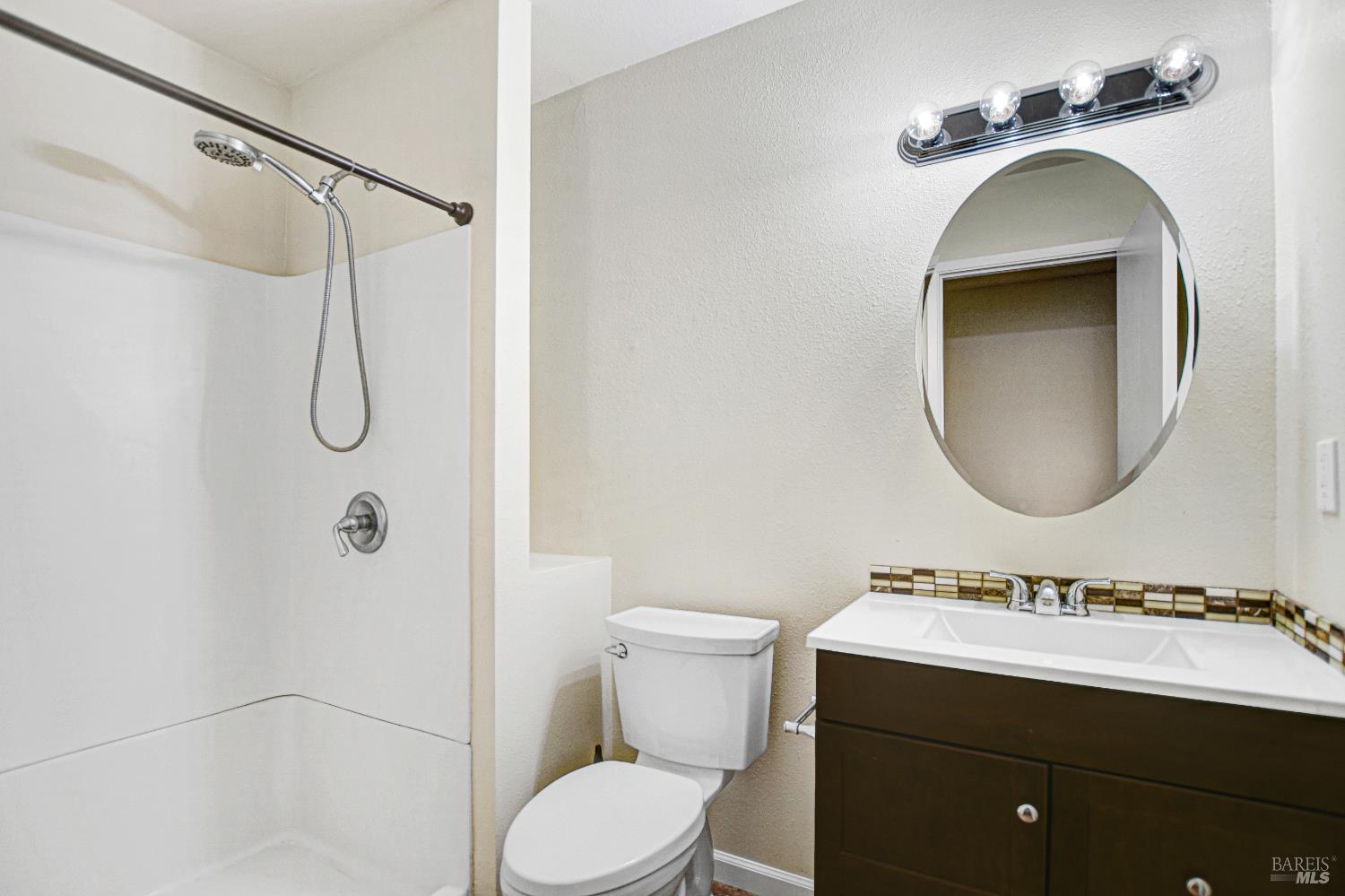 7257 Belita Avenue Rohnert Park, CA 94928 - Photo 37 of 37 a bathroom with a sink a toilet and shower