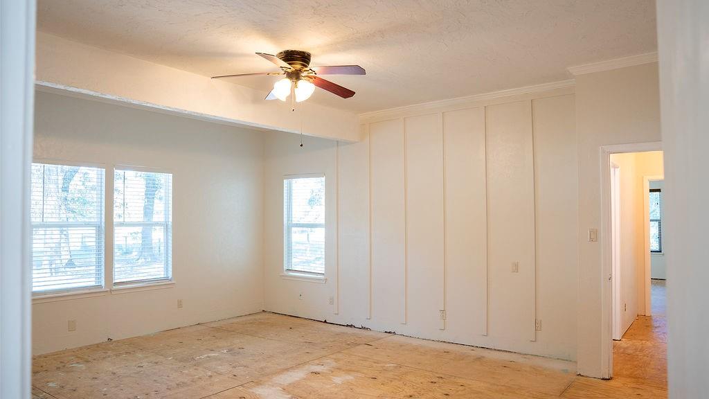 213 County Road 2320 Telephone, TX 75488 - Photo 13 of 40 Primary bedroom is located at back of home.