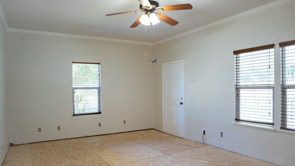 213 County Road 2320 Telephone, TX 75488 - Photo 15 of 40 Bedroom has door access to front porch.