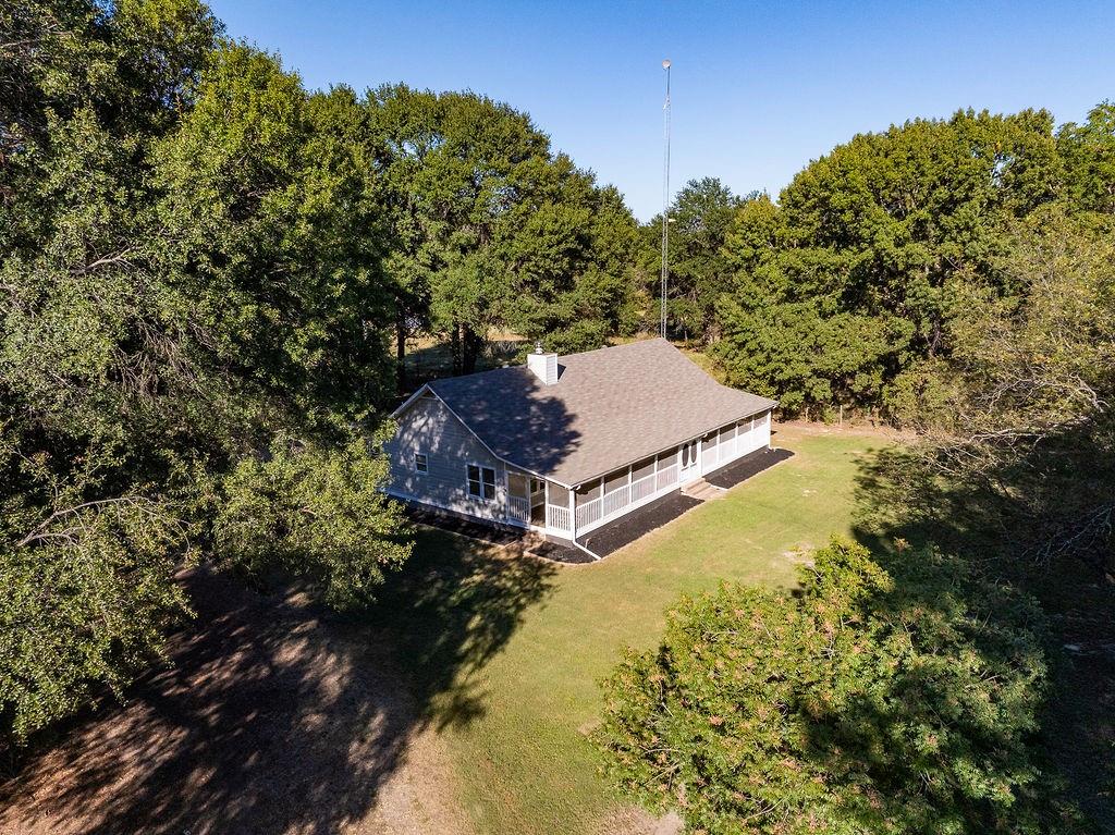 213 County Road 2320 Telephone, TX 75488 - Photo 3 of 40 Home is nestled on 22 acres.