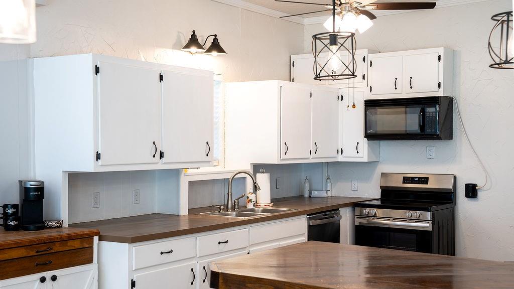 213 County Road 2320 Telephone, TX 75488 - Photo 7 of 40 Kitchen is open to living and dining