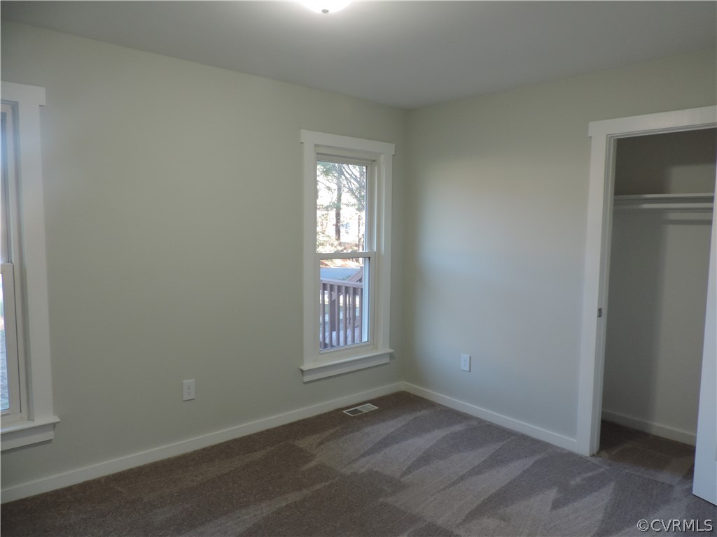 7825 Valencia Road Chesterfield, VA 23832 - Photo 18 of 26 an empty room with windows