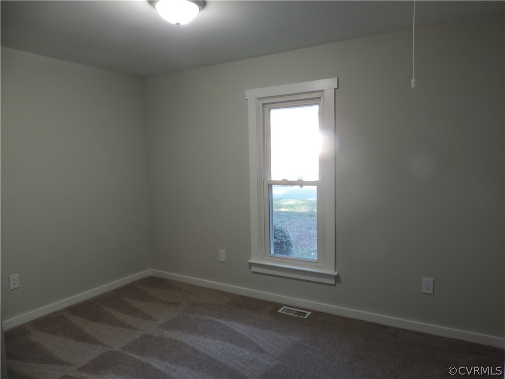 7825 Valencia Road Chesterfield, VA 23832 - Photo 19 of 26 an empty room with a window