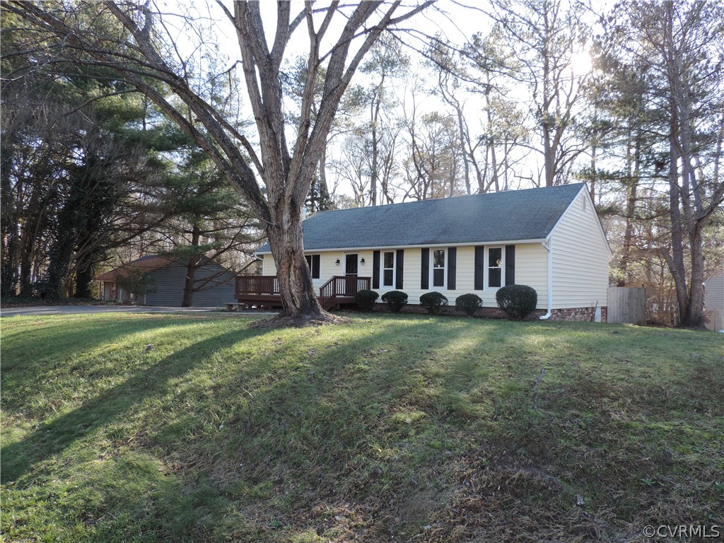 7825 Valencia Road Chesterfield, VA 23832 - Photo 2 of 26 a view of a house with a yard