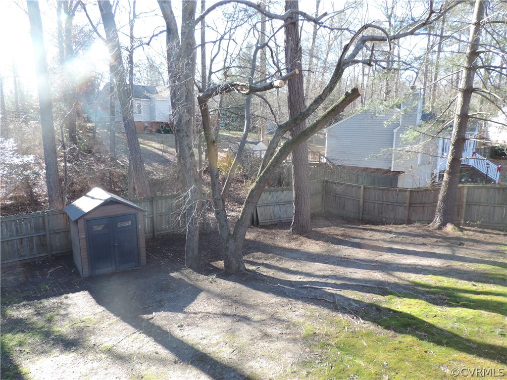 7825 Valencia Road Chesterfield, VA 23832 - Photo 25 of 26 a view of a house with a yard