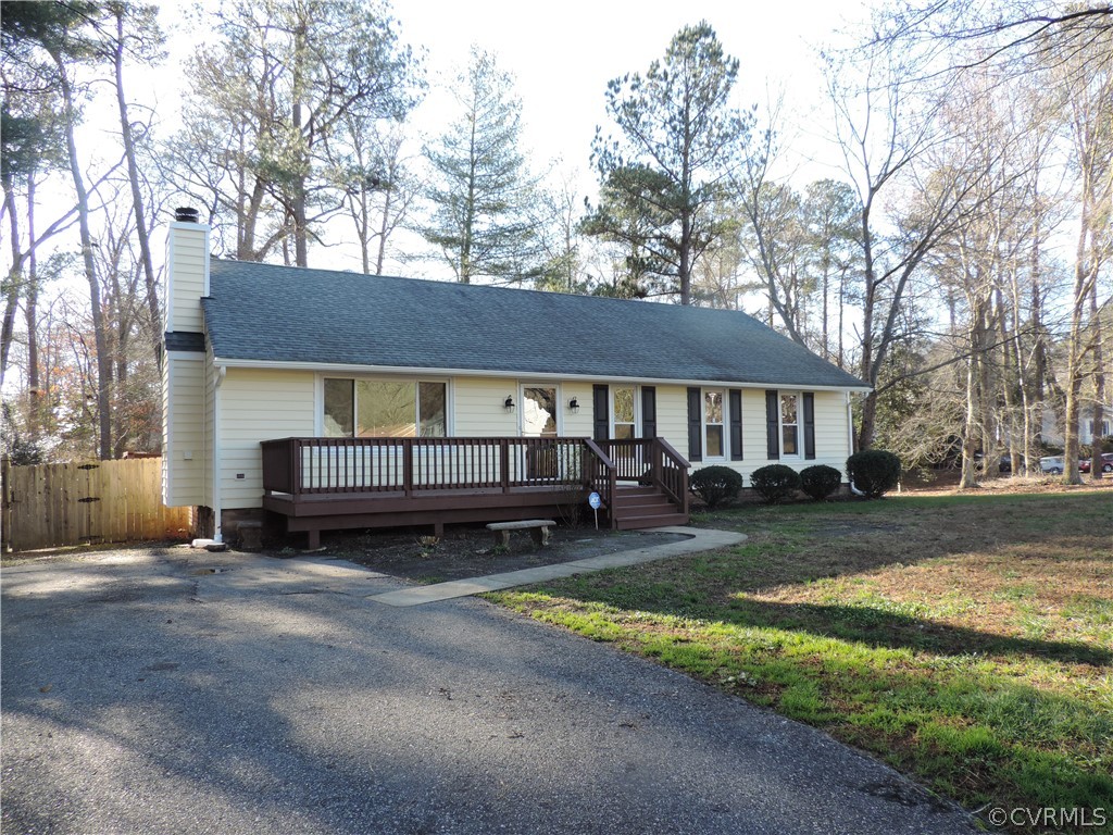 7825 Valencia Road Chesterfield, VA 23832 - Photo 3 of 26 a view of a house with a yard and sitting area