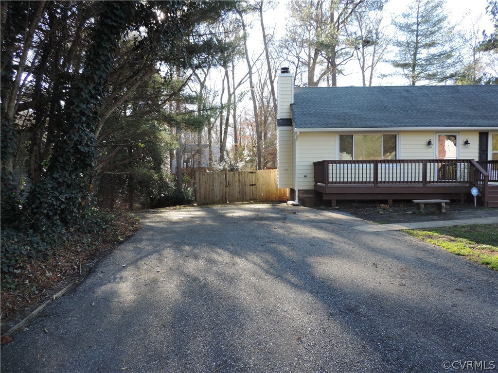 7825 Valencia Road Chesterfield, VA 23832 - Photo 4 of 26 a view of a house with a yard