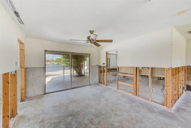 a view of a livingroom with a furniture and a ceiling fan