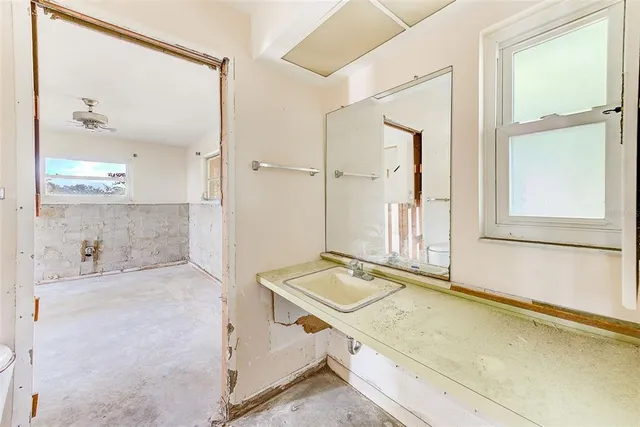 an empty room with windows