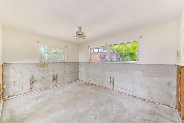 a bathroom with a double vanity sink mirror and shower