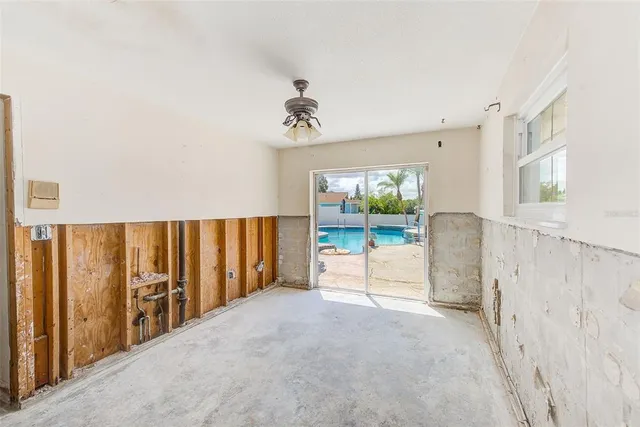 a view of a room with a large window