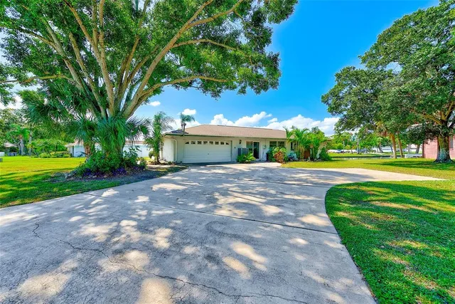 a view of a house with a swimming pool