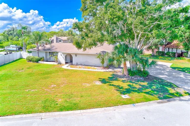 a view of an swimming pool with an outdoor space and seating area
