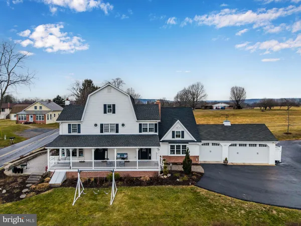 a view of a house with a sink and a yard