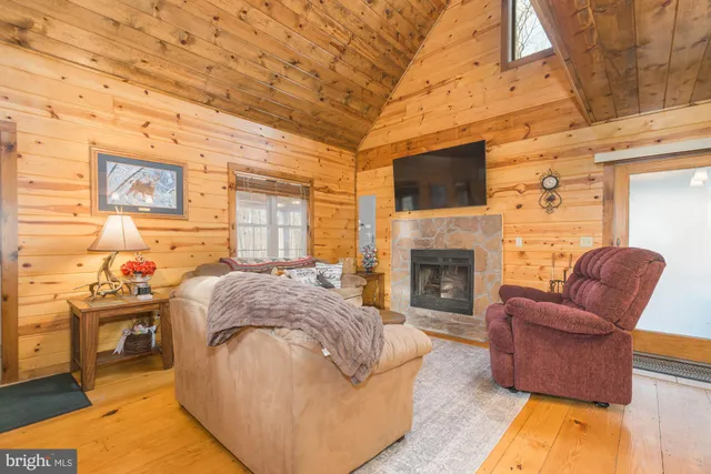 a view of a kitchen with a sink and cabinets