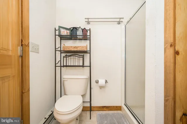 a view of a hallway with washer and dryer
