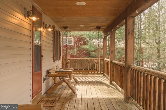a view of outdoor space with wooden floor