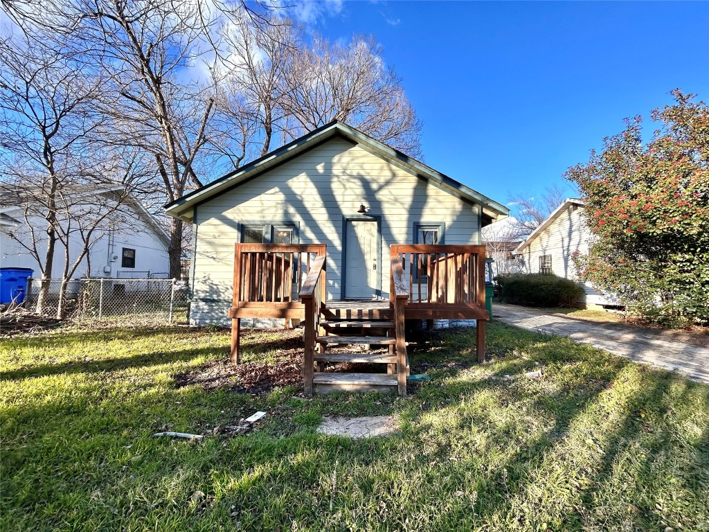 1112 West 3rd Street Taylor, TX 76574 - Photo 2 of 24 View of front of house featuring a wooden deck