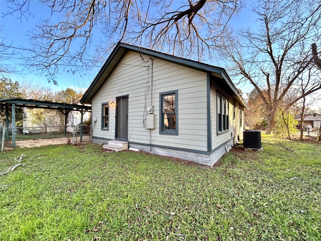 1112 West 3rd Street Taylor, TX 76574 - Photo 5 of 24 Back of property featuring entry steps