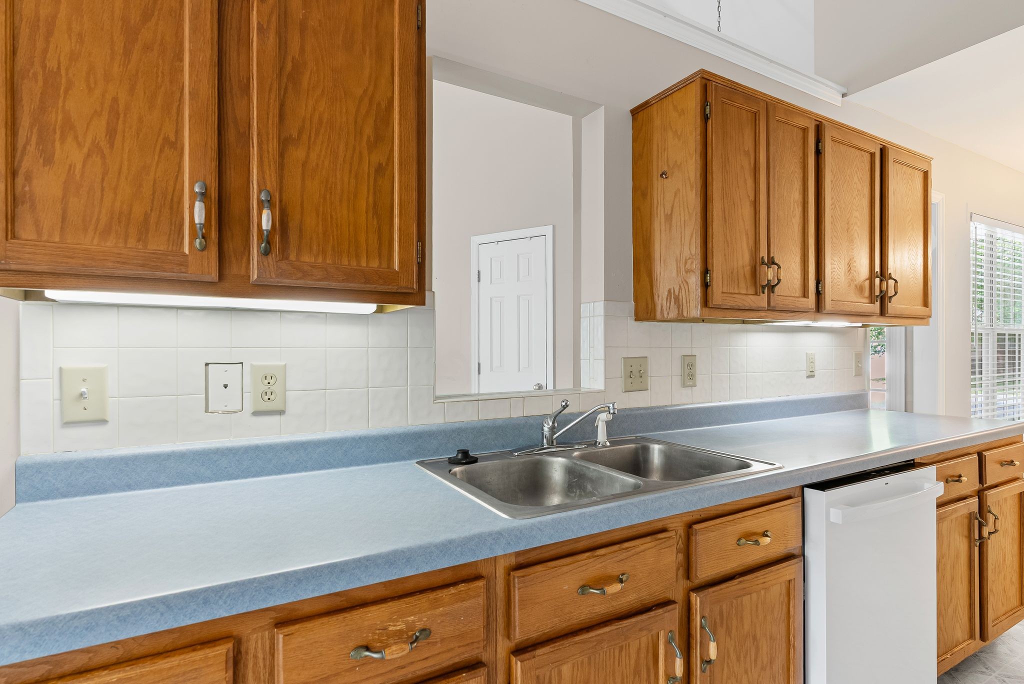 3012 Bent Tree Road Franklin, TN 37067 - Photo 13 of 34 a kitchen with stainless steel appliances granite countertop white cabinets a sink and dishwasher