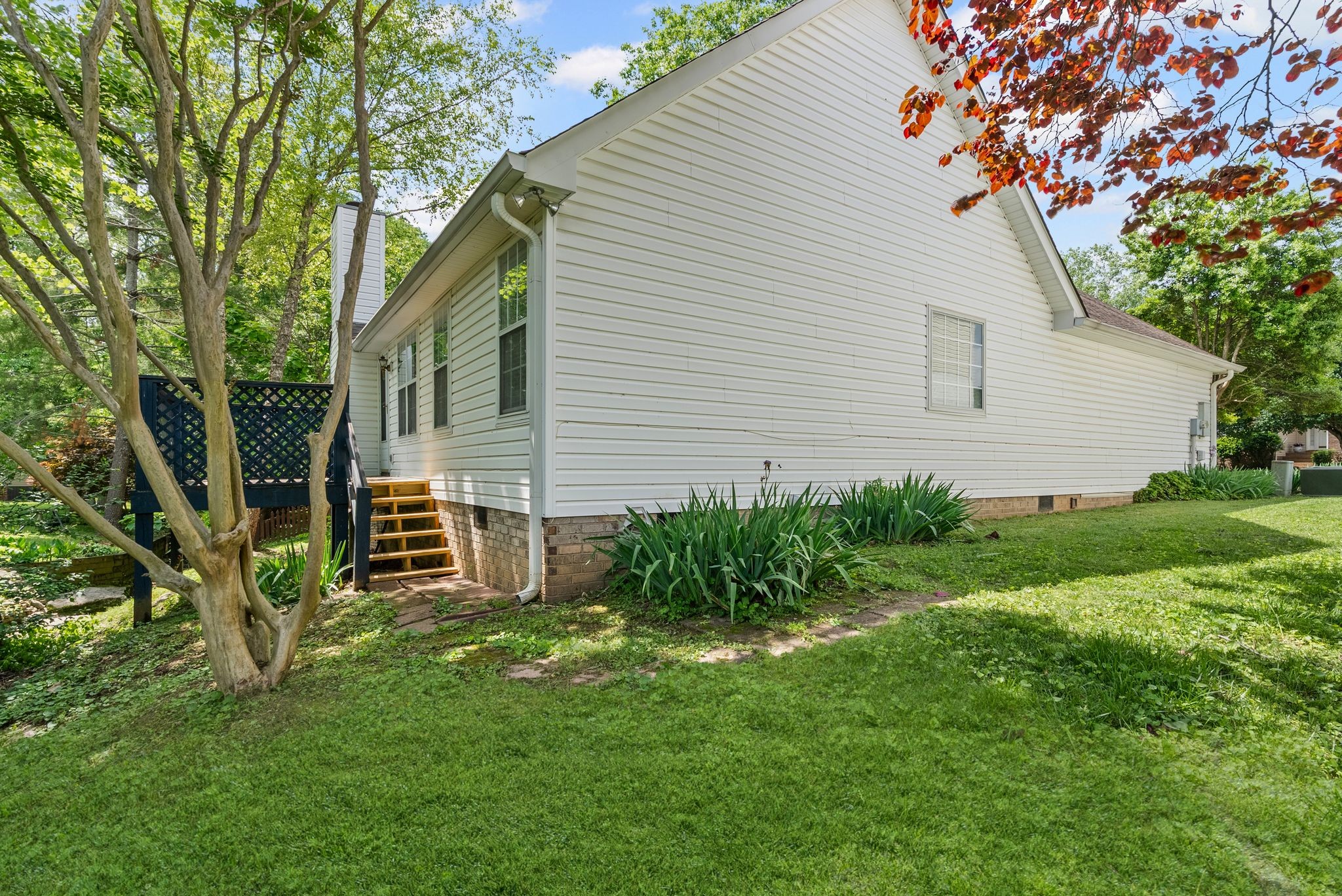3012 Bent Tree Road Franklin, TN 37067 - Photo 29 of 34 a backyard of a house with lots of green space