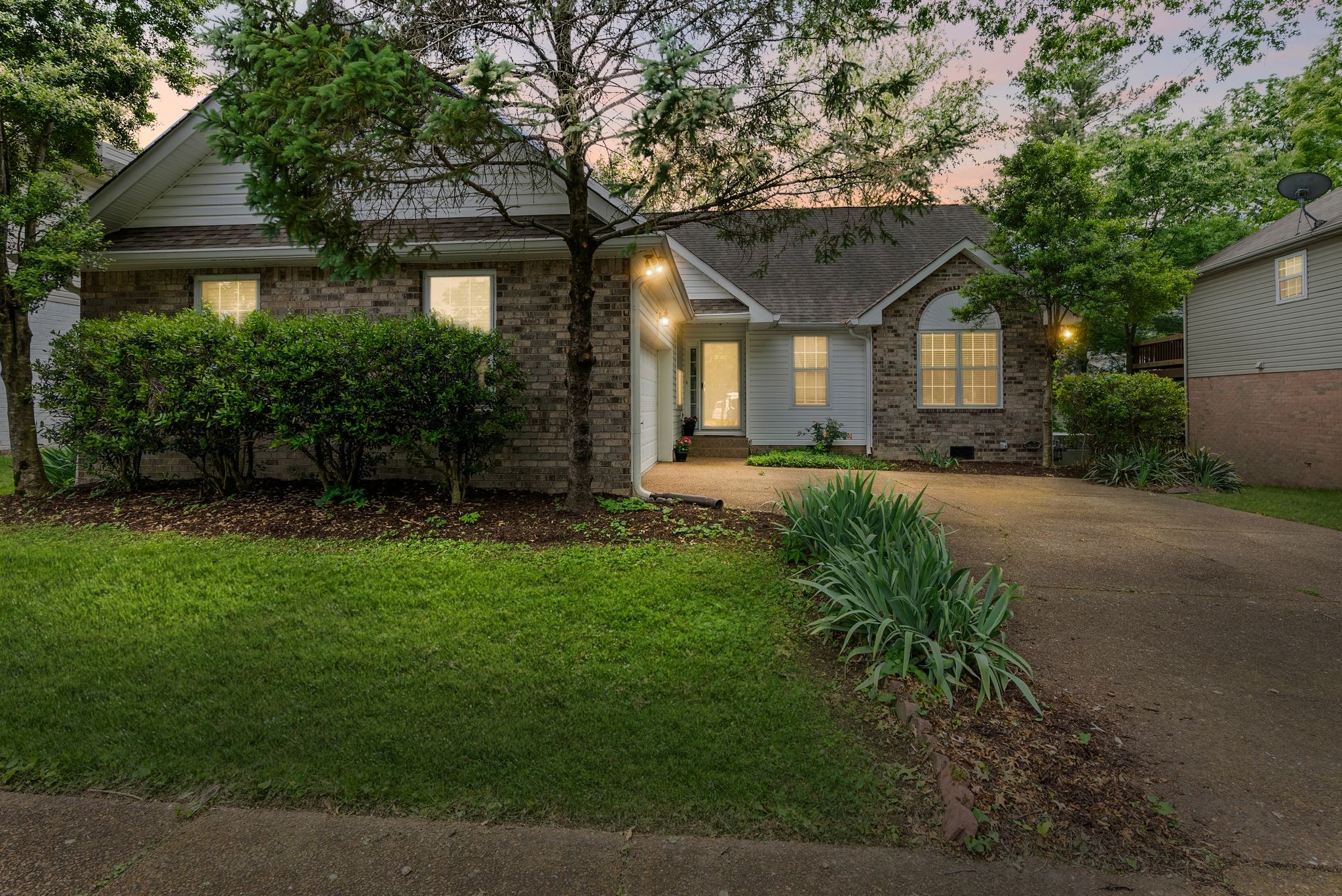 3012 Bent Tree Road Franklin, TN 37067 - Photo 4 of 34 a front view of a house with a yard
