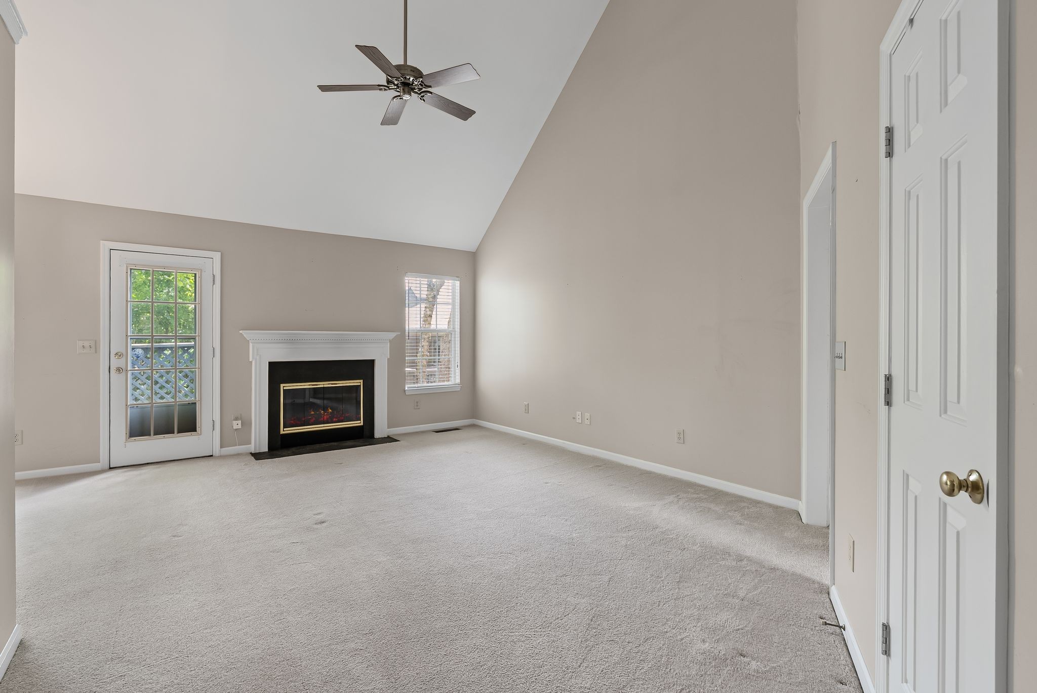 3012 Bent Tree Road Franklin, TN 37067 - Photo 7 of 34 an empty room with windows and fireplace