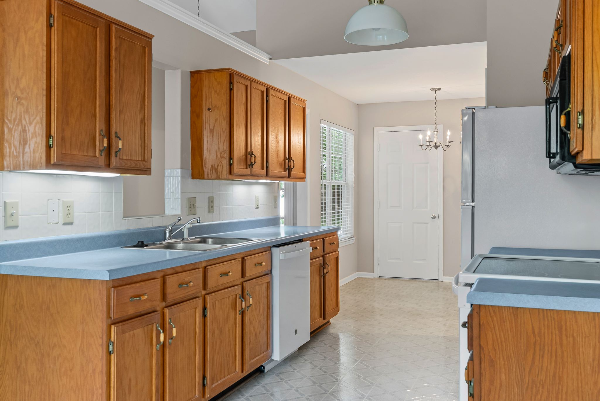 3012 Bent Tree Road Franklin, TN 37067 - Photo 10 of 34 a bathroom with a granite countertop sink and a mirror