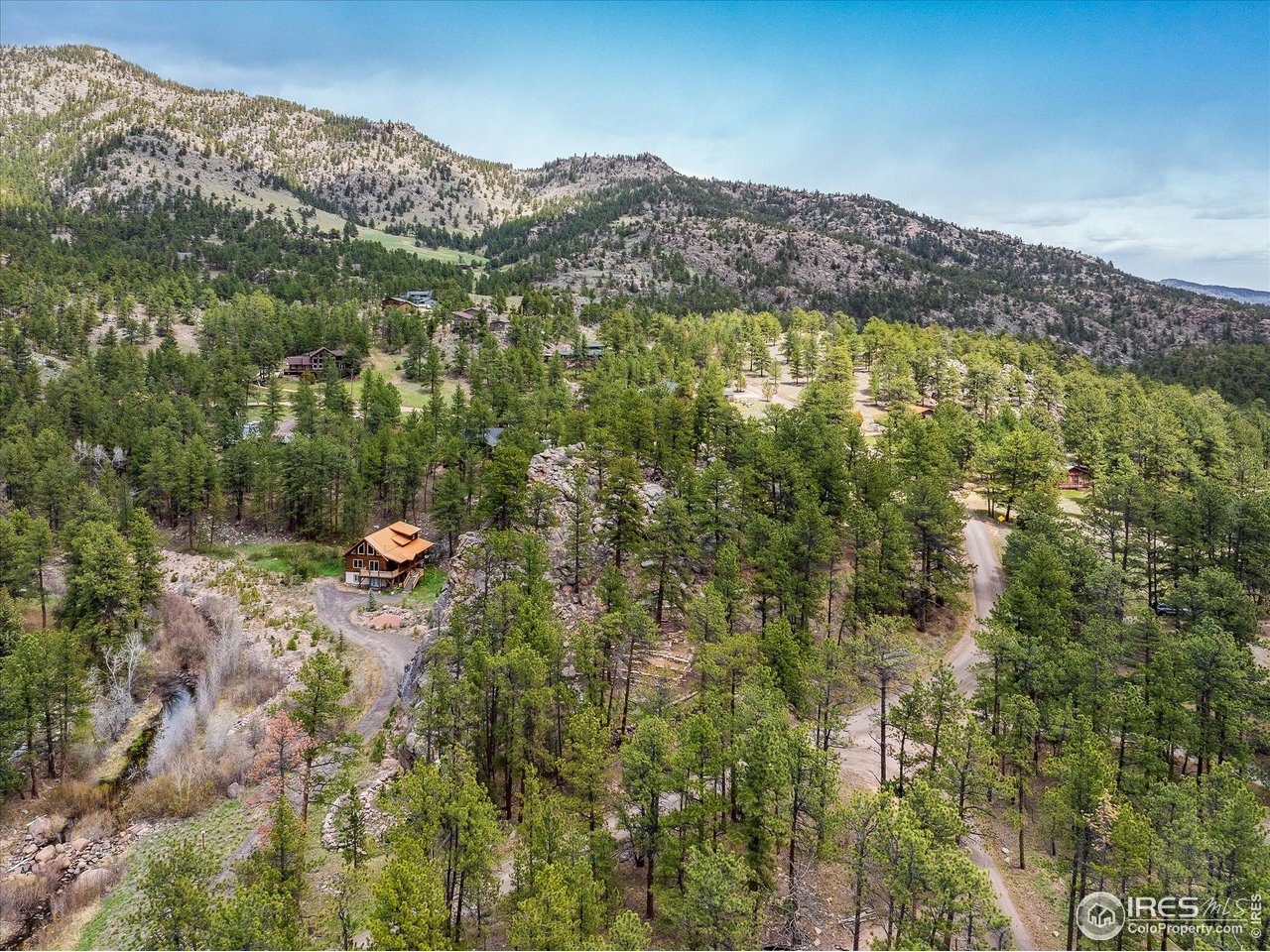 1289 Kiowa Road Lyons, CO 80540 - Photo 20 of 37 a view of a mountain