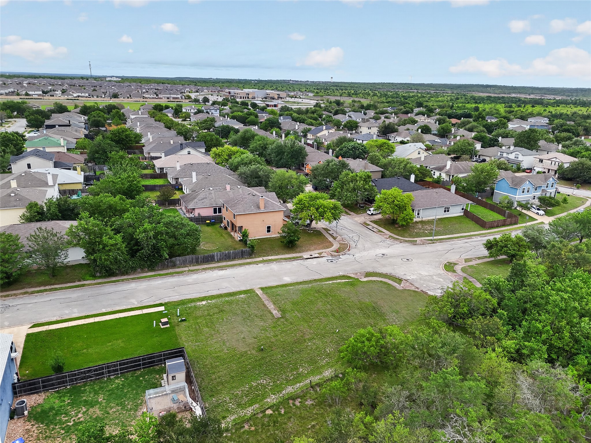 11908 Athens Street Manor, TX 78653 - Photo 15 of 15 Aerial view showcasing the neighborhood and surrounding green spaces