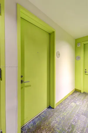 a room with a washing machine and sink