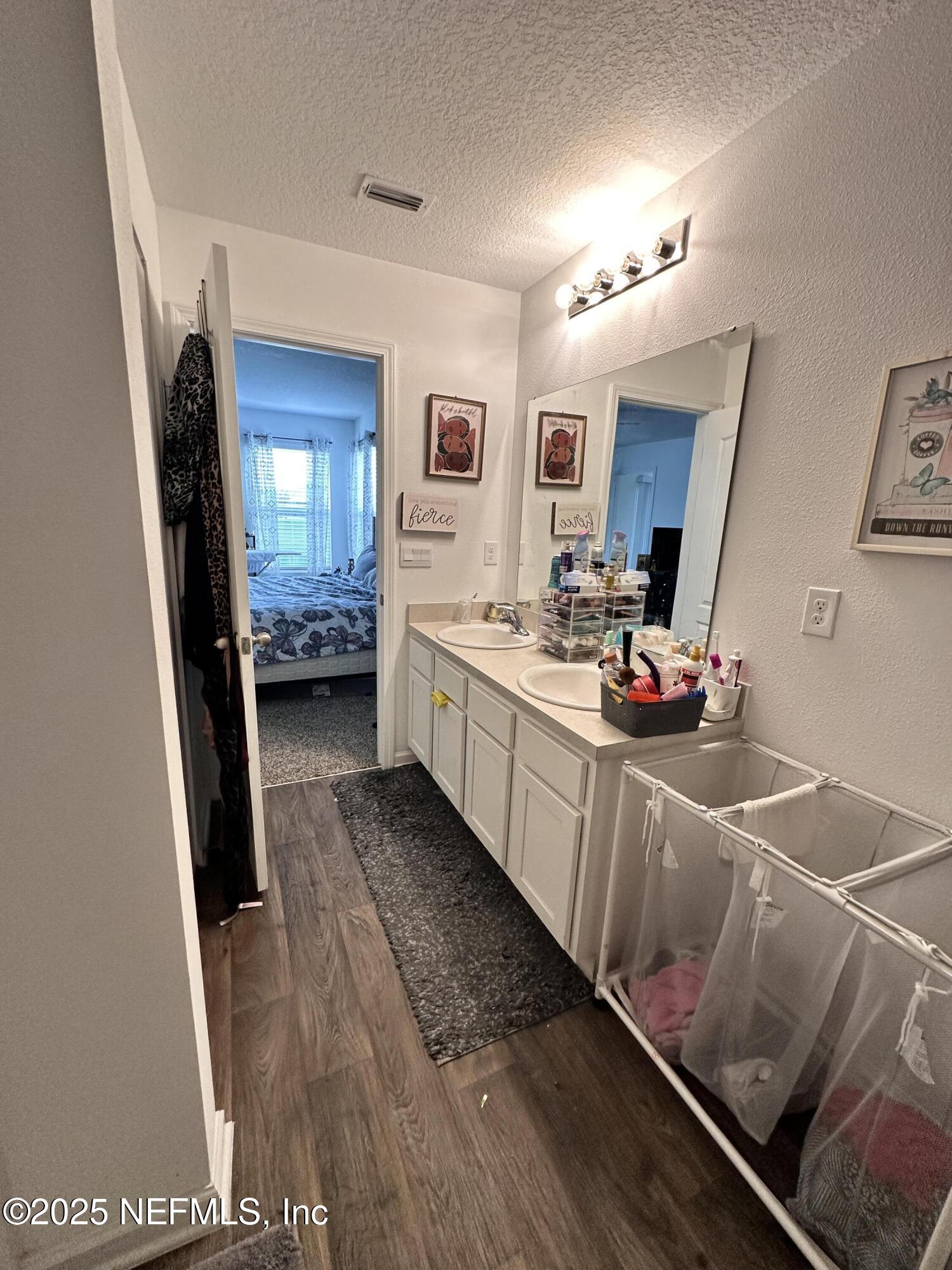 2769 Oak Strm Drive Green Cove Springs, FL 32043 - Photo 14 of 17 a kitchen with sink refrigerator and stove