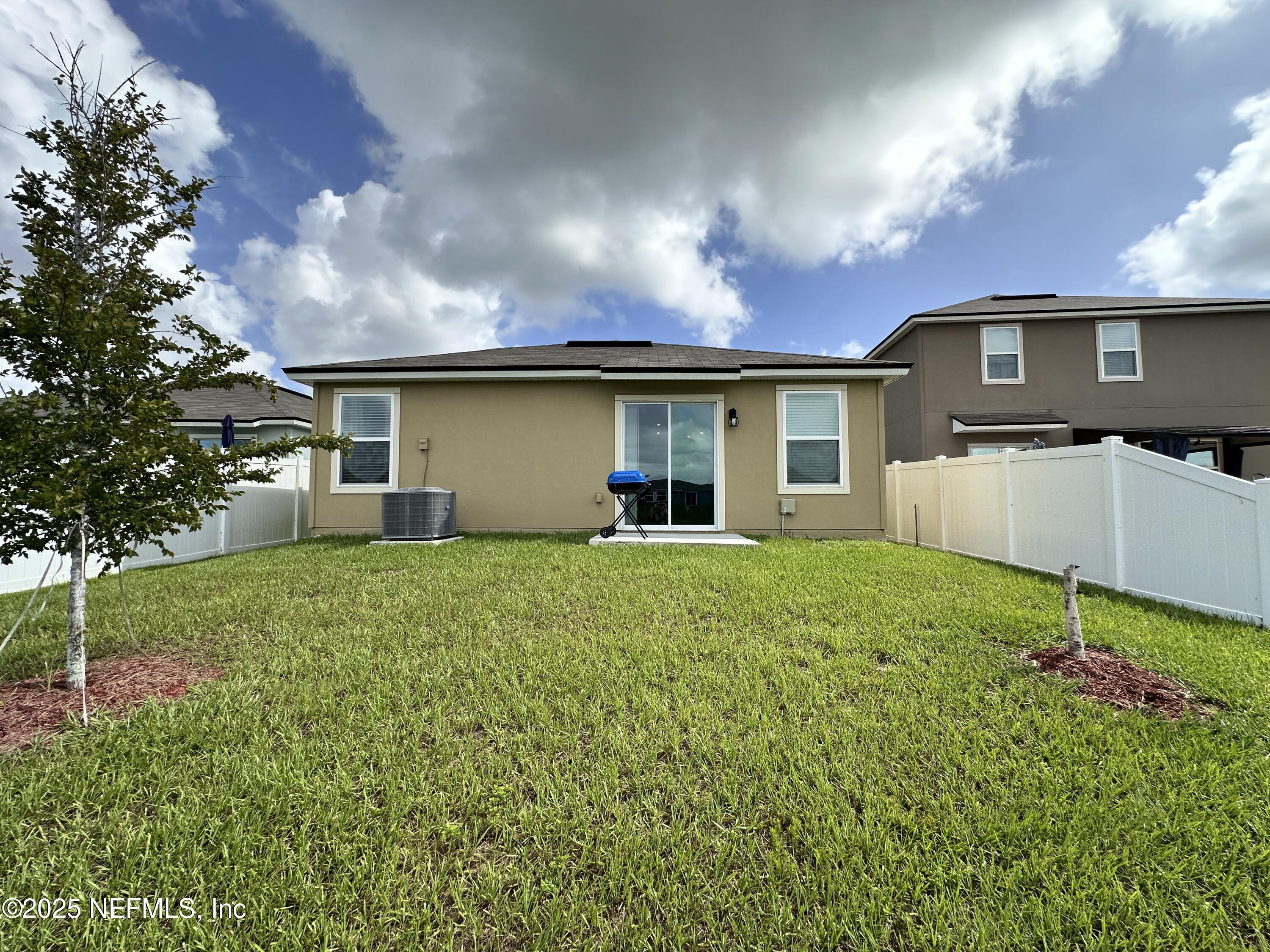 2769 Oak Strm Drive Green Cove Springs, FL 32043 - Photo 17 of 17 a house view with a garden space