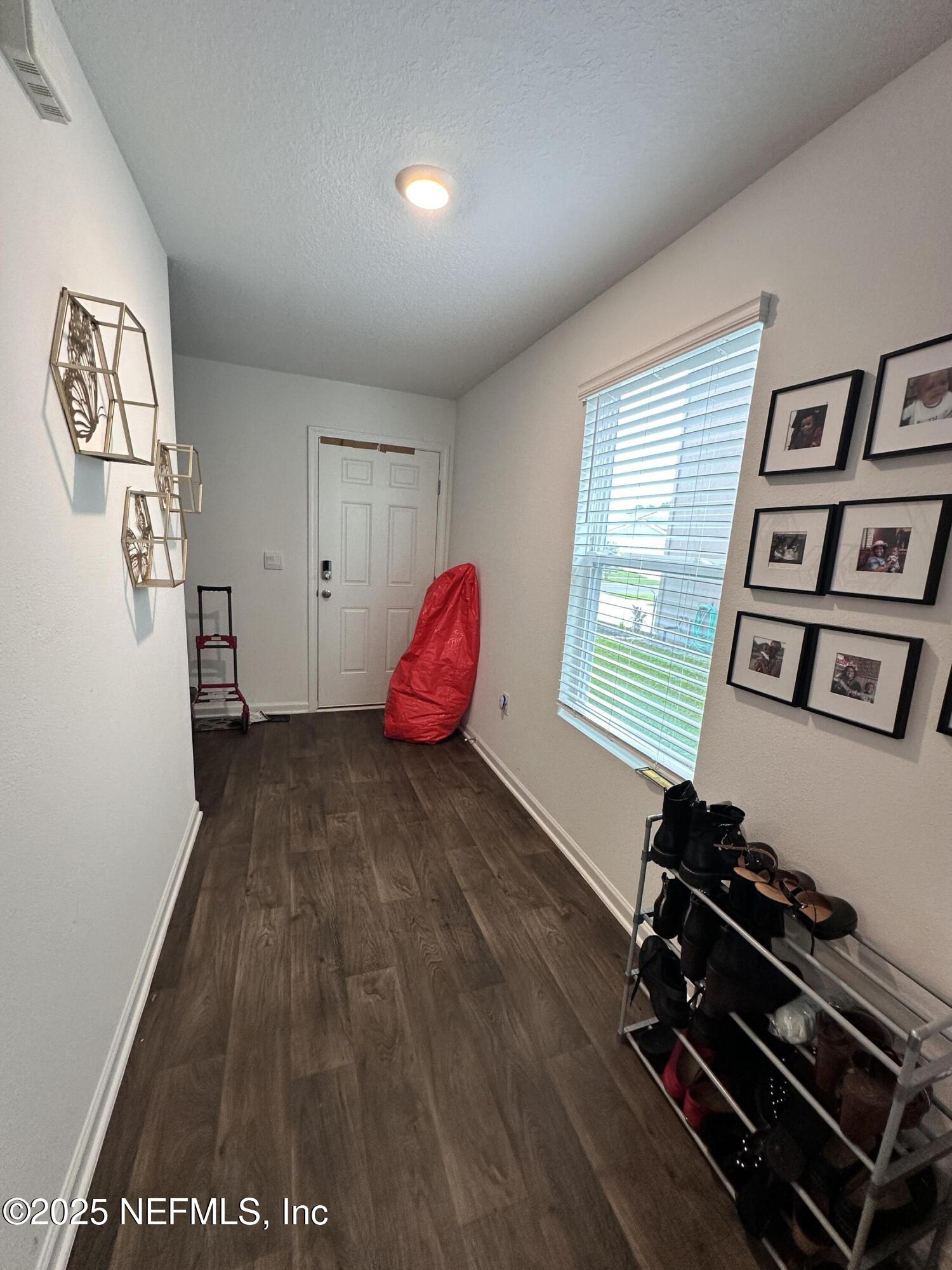 2769 Oak Strm Drive Green Cove Springs, FL 32043 - Photo 8 of 17 a room with furniture and a window